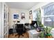Bright office space with natural light, desk, and decorative accents at 2606 W Knox St, Durham, NC 27705