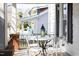 Charming porch featuring seating area with stylish lantern and wrought iron railings at 2606 W Knox St, Durham, NC 27705