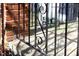 Elegant wrought iron railing detail on a charming front porch entrance at 2606 W Knox St, Durham, NC 27705