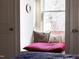 Comfortable window seat with natural light, creating a peaceful spot for reading and relaxation at 2606 W Knox St, Durham, NC 27705