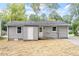 View of home's backyard with siding and a door to the outside at 2612 Glenbrook Dr, Durham, NC 27704