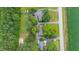 Aerial view featuring single-Gathering homes with sprawling green yards and mature trees at 2732 Old Milburnie Rd, Raleigh, NC 27604