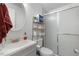 Bright bathroom featuring a glass-enclosed shower, a vanity and a large mirror at 2732 Old Milburnie Rd, Raleigh, NC 27604