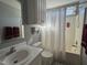 Bathroom featuring a tub and shower combination and a white vanity at 305 River Birch Run, Coats, NC 27521