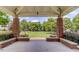 Beautiful view of gazebo from house showcasing lush green lawn and mature trees at 401 Finsbury St # 301, Durham, NC 27713