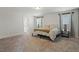 Bright bedroom featuring plush carpet, neutral walls, and a king bed at 456 Highview Dr, Benson, NC 27504