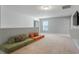 Bright bonus room features modular seating and a cozy atmosphere at 456 Highview Dr, Benson, NC 27504