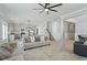 Bright living room leads to a modern kitchen and dining area, perfect for gatherings at 456 Highview Dr, Benson, NC 27504