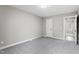 Spacious bedroom features plush carpeting, neutral paint, ample natural light, and closet space at 4610 Lemon Heights Dr, Sanford, NC 27332