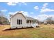 Charming single-story home featuring a welcoming front porch and well-manicured landscaping at 4610 Lemon Heights Dr, Sanford, NC 27332