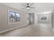 Spacious living area with ceiling fan, hardwood flooring, and views to the outside at 4610 Lemon Heights Dr, Sanford, NC 27332