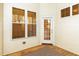 Back porch featuring wood floors, siding, and windows at 4618 Pooh Corner Dr, Raleigh, NC 27616