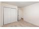 Cozy bedroom features a double door closet providing ample storage space, and neutral carpeting at 4618 Pooh Corner Dr, Raleigh, NC 27616