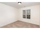 Cozy bedroom with carpet, featuring a window, and ample natural light at 4618 Pooh Corner Dr, Raleigh, NC 27616