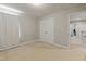Bedroom showcasing neutral walls, carpet flooring, and a large closet for storage at 50 Fontaine Dr, Franklinton, NC 27525
