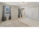 Spacious bedroom features two windows with natural light, neutral carpet, and a double door closet at 50 Fontaine Dr, Franklinton, NC 27525