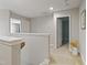 Upstairs hallway with neutral decor and carpeted flooring at 50 Fontaine Dr, Franklinton, NC 27525