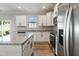 Modern kitchen featuring stainless steel appliances, granite countertops, and ample cabinet space at 50 Fontaine Dr, Franklinton, NC 27525