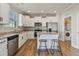 Well-equipped kitchen with stainless steel appliances, ample counter space, and eat-in island seating at 50 Fontaine Dr, Franklinton, NC 27525