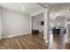 Spacious room with hardwood floors, large windows, contemporary lighting and open floor plan at 50 Fontaine Dr, Franklinton, NC 27525