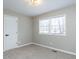 Cozy bedroom with natural light from double windows and neutral carpeting, creating a peaceful retreat at 512 Trail Of Merlin, Garner, NC 27529