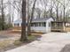 Charming single-story home with a well-maintained yard, offering a welcoming and inviting facade at 512 Trail Of Merlin, Garner, NC 27529