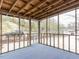 Enclosed porch with a view to the driveway, offering a private outdoor lounge at 512 Trail Of Merlin, Garner, NC 27529