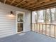 Enclosed porch with access to the yard, providing an ideal space for relaxing outdoors at 512 Trail Of Merlin, Garner, NC 27529