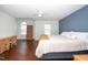 Large primary bedroom offers generous space, beautiful floors, and natural light at 521 Renshaw Ct, Cary, NC 27518