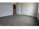 Bedroom features neutral carpet, grey walls and large closet with double doors at 530 Sweet Potato Lane # 41, Nashville, NC 27856