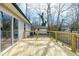 Wooden back deck with black metal railings, offering a relaxing outdoor space at 5635 Paragon Cir, Durham, NC 27712