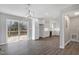 Open concept living room featuring modern flooring and a seamless transition to the outdoors at 5635 Paragon Cir, Durham, NC 27712