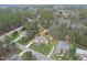 Brick home situated on large lot with mature trees and lush green lawn at 6 Kersey Ct, Durham, NC 27713