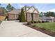Charming brick home with manicured landscaping and inviting driveway at 6 Kersey Ct, Durham, NC 27713