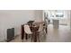 Dining room features hardwood floors, a modern table with seating for four, and lots of natural light at 712 E Edenton St # 102, Raleigh, NC 27601