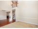 Inviting living room showcasing an open floor plan, hardwood floors, and a grand staircase at 9510 Dellbrook Ct, Raleigh, NC 27617