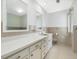 Well-lit bathroom with a large countertop, tile flooring, and a convenient toilet at 9550 Silk Hope Liberty Rd, Siler City, NC 27344