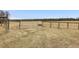Field with a metal gate and post and plank fencing at 9550 Silk Hope Liberty Rd, Siler City, NC 27344