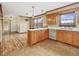 Charming kitchen features an island, traditional cabinets, and vintage appliances at 9550 Silk Hope Liberty Rd, Siler City, NC 27344