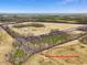 An aerial view showcases this generous land parcel, with approximate boundary lines highlighted at 9550 Silk Hope Liberty Rd, Siler City, NC 27344