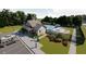 Aerial view of community pool and clubhouse, surrounded by lush landscaping and trees at 101 N Chubb Rdg, Clayton, NC 27520