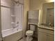 Clean bathroom featuring a combination shower and tub plus vanity storage at 10420 Sablewood Drive Dr # 102, Raleigh, NC 27617