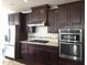 Modern kitchen featuring stainless steel appliances and granite countertops at 10420 Sablewood Drive Dr # 102, Raleigh, NC 27617