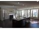 Bright living room showcases large windows, hardwood floors, a fireplace, and an open layout at 10420 Sablewood Drive Dr # 102, Raleigh, NC 27617