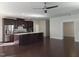 Open-concept living room with hardwood floors, stainless steel appliances, and ample natural light at 10420 Sablewood Drive Dr # 102, Raleigh, NC 27617