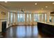 Bright living room with hardwood floors, a fireplace, stainless appliances, and modern recessed lighting at 10420 Sablewood Drive Dr # 102, Raleigh, NC 27617