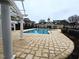 Community pool featuring stamped concrete and pergola at 10420 Sablewood Drive Dr # 102, Raleigh, NC 27617