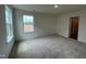 Bright bedroom with a view and neutral carpet offering lots of space at 116 Willow Cameron Way, Angier, NC 27501