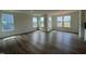 Bright living room featuring large windows and open-concept design at 116 Willow Cameron Way, Angier, NC 27501