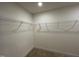 Walk-in closet offering lots of space and custom shelving at 116 Willow Cameron Way, Angier, NC 27501